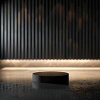 A black round object sitting on a table in front of a wall photo