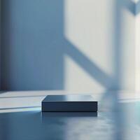 A box sitting on a table in front of a window photo