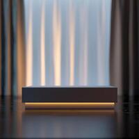 A white box sitting on a table in front of curtains photo