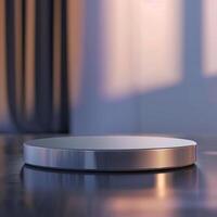 A silver wireless charging pad on a table photo