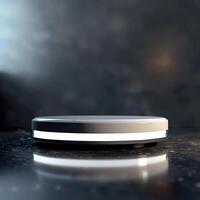 A circular object on a table with a light on it photo