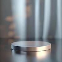 A white round podium on a table with a curtain in the background photo