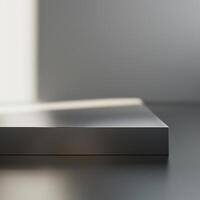 A white box sitting on a table in front of a wall photo