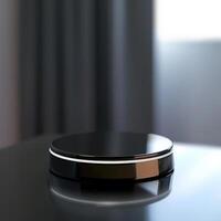 A black object on a table with a window in the background photo