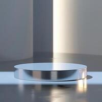 A white round table in a room with a light shining on it photo
