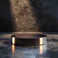 A round object on a table in front of a wall photo