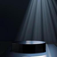 An empty black pedestal with light shining from the top photo