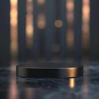 A black round object on a table in front of a blurred background photo