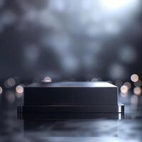 Black box on a shiny surface with bokeh lights photo