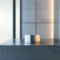 A silver object sitting on a counter in front of a window photo