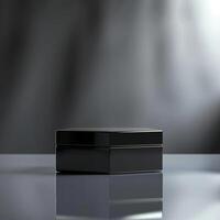 Black box on a table with a reflection photo