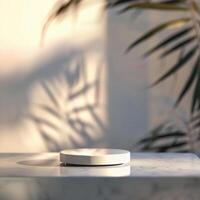 A white object on a table with a plant in the background photo