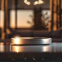 A ring sitting on a table in front of a window photo