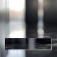 A black square on a table in a dark room photo