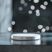 A white object on a table in front of a blurry background photo