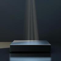 A spotlight shines on a black surface photo