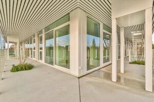 A view of the outside of a building with glass doors photo