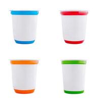Set of blank yogurt cups with colorful lids isolated on white background photo