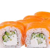 Philadelphia sushi rolls with salmon and cucumber standing on white background photo
