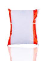 Blank white product package reflecting on a white background photo