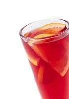 Refreshing red cocktail with orange slices on white background photo
