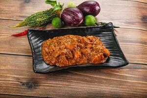 Indian cuisine - chicken masala sauce photo