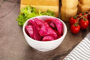 Red pickled cabbage with beetroot photo