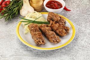 Beef kebab minced meat with onion photo