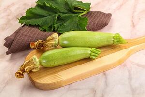 Green young small baby zucchini photo