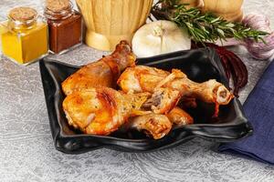 Raw marinated chicken drumstick for cooking photo