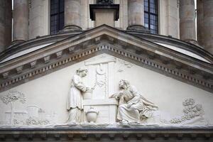 Detail of the Ornate Facade of Franzosische Dom in Berlins Gendarmenmarkt photo