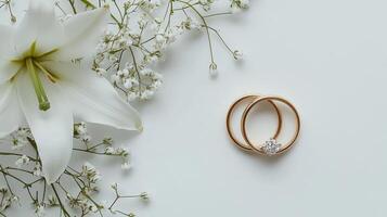 wedding ring and white lilies photo