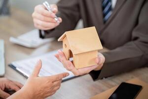Real Estate Agent Discussing Property Investment with Client photo