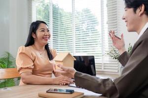 Mortgage Consultant Discussing Housing Plans with Client for Homeownership Solution photo