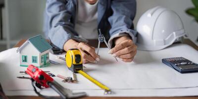 Architect Utilizing Modeling Tools for Accurate Construction Blueprint Designs photo