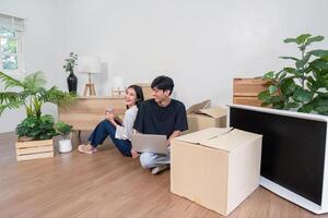 Couple Enjoying Relaxed Moments During Home Move-In Process photo