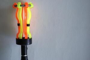 Lightbulb or lamp changing replacement stick with copy space area photo