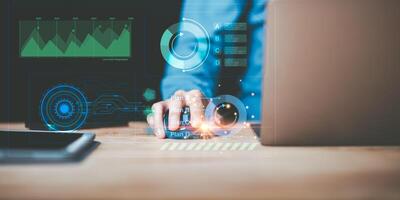 Businessman reading graph report and business statistics charts ,Analysis and improvement of corporate strategy ,Statistics and Data Concepts ,business growth graph ,Business analytics connected photo