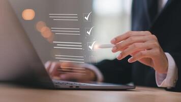 operator makes mark on the survey topic ,Checklist with checkmarks and checkboxes ,online quality assessment ,satisfaction, quality inspection ,Qualification for Measurement photo