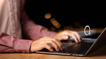 Businessman searching for business information through virtual screen,Searching for information he is interested in through online websites,keyword search ideas to find references,insight research photo