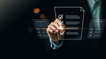 Accountant showing office document auditing concept ,plan review process and assess correctness ,Management of important document storage of organization ,document system ,accountant Audit documents photo
