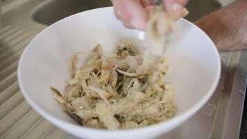 Chef's Hand Is Selecting White Sea Prawns In A Bowl video