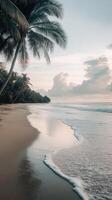 Tranquil tropical beach at dusk with gentle waves and palm trees photo