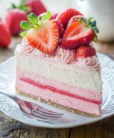Creamy strawberry mousse cake served on a plate with fresh berries photo