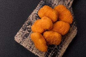 fried chicken pane chicken breast fillets isolated on white background photo