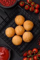 Fast food cheese balls breaded with salt and spices photo