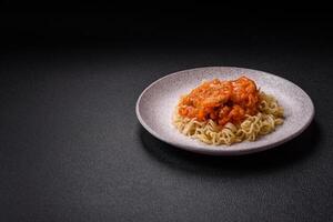 Rice noodles with fish and sauce, salt and spices photo