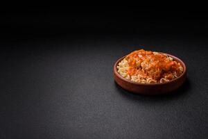 Rice noodles with fish and sauce, salt and spices photo