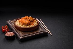 Rice noodles with fish and sauce, salt and spices photo