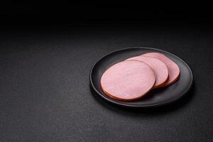 Delicious fresh ham with salt, spices and herbs photo